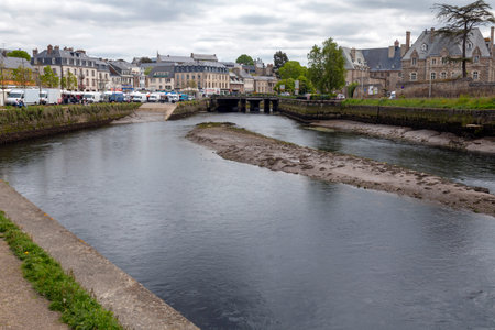 Lannion, Brittany, France - May 19, 2016: View across the Le Leguer river towards the market town of...