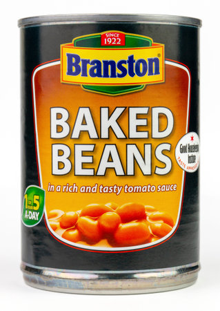 Coventry, West Midlands, UK - May 13, 2020: Unopened can of Branston baked beans on an isolated white backgroundのeditorial素材