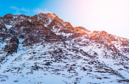 Snow mountain at sunrise in norwayの写真素材