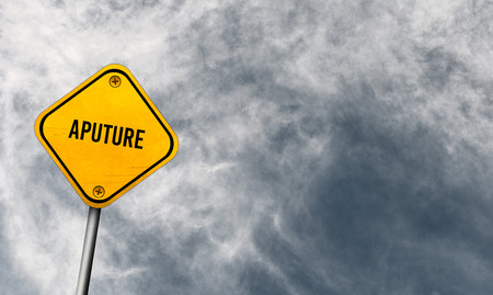 aputure - yellow sign with cloudy skyの写真素材