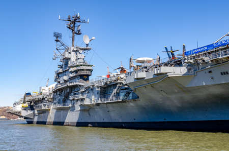 Intrepid Sea-Air-Space Museum at Hudson River side view, New York City during sunny winter day with clear sky, horizontalのeditorial素材