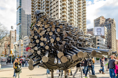 Dove made out of black nail, rear view, Art at Flatiron Public Plaza, New York City during sunny...