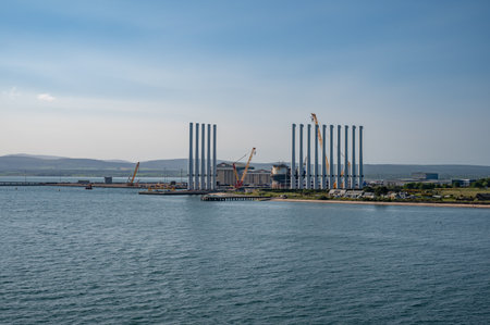 Offshore wind turbine construction company at the sea near Invergordon, Scotlandの写真素材