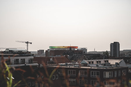 ARoS Aarhus Art Museum, view from the distance aerial view with city and buildings and plants in front in the evening, Denmarkのeditorial素材
