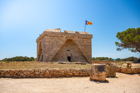 Castell de sa Punta de n Amer, Cala Millor, Majorca with no people, flag on the top, clear sky, horizontal shot, Mallorcaのeditorial素材