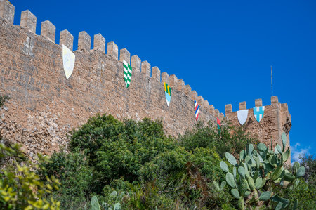 Castell de Capdepera, Mallorca Castle wall with coat of arms on top of the wall, horizontal shot, majorcaの写真素材