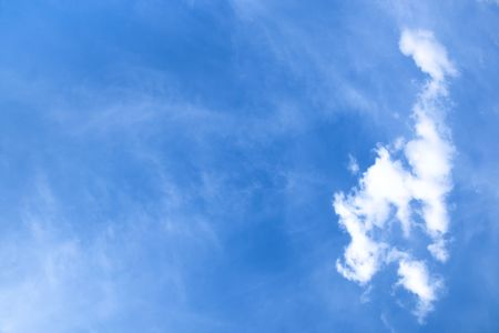A photography of a vertical white cloudの写真素材