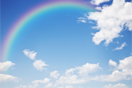a blue sky rainbow backgroundの写真素材