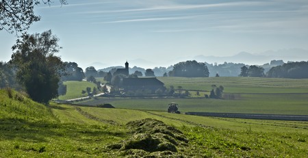 An image of a beautiful landscape with fog in bavaria germanyの写真素材