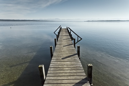 An old jetty at Starnberg Lake in Germanyの写真素材