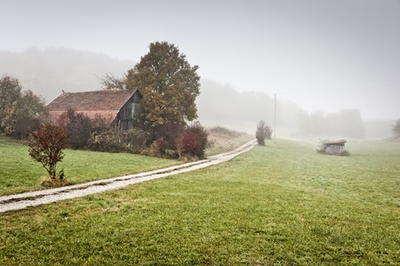 An image of a beautiful landscape with fog in bavaria germanyのeditorial素材