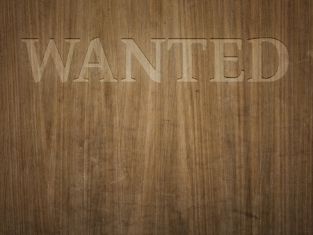 A beautiful wooden background with the word wantedの写真素材
