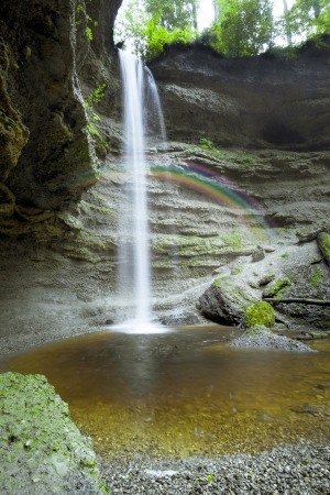 An image of a nice waterfall with rainbow at the Paehler Schlucht in Bavaria Germanyの写真素材
