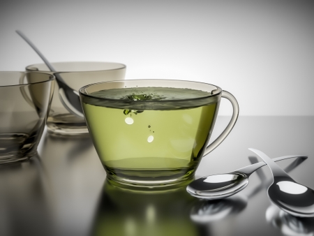 An image of a cup of green tea with artificial sweetenerの写真素材