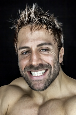 An image of a handsome young muscular sports manの写真素材