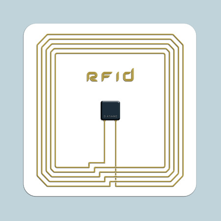 An image of an isolated electronical rfid card in front of a blue backgroundの写真素材