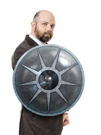 An image of a handsome business man with a shieldの写真素材