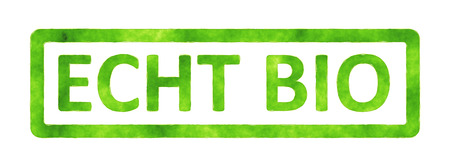 A stamp with the text truly organic in german languageの写真素材