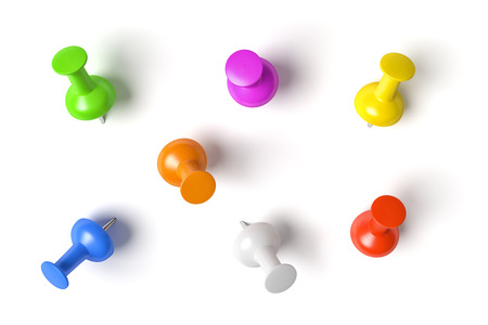 Some push pins in different colors isolated on a white backgroundの写真素材
