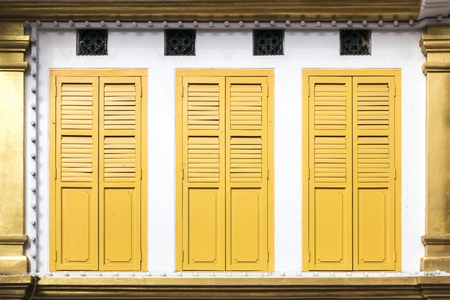 An image of three yellow window doorsの写真素材