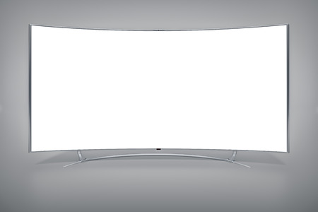 An image of a big curved widescreen televisionの写真素材