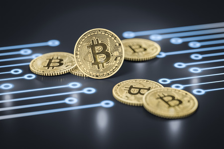 3d rendering of a some bitcoin coins on a dark electronic backgroundの写真素材