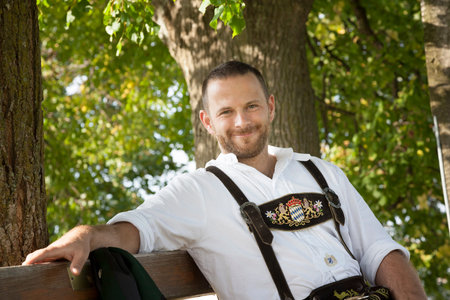 An image of a bavarian tradition man in the grassの写真素材