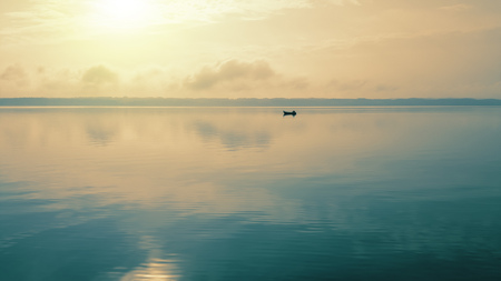 An image of a lonely boat at lake Starnbergの写真素材