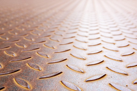 An image of a rusty diamond metal plate