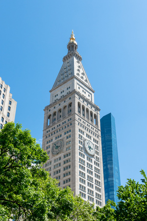 NEW YORK - MAY 2018 - Clock Tower building with One Word Trade Center on May 23, 2018 in Manhattan New York City.のeditorial素材