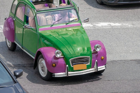 An image of an old vintage small car