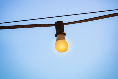 An image of old light bulb outsideの写真素材