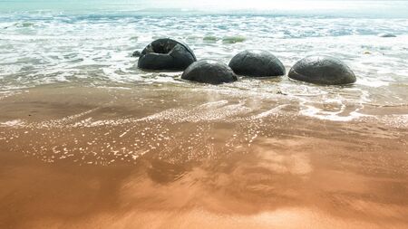 An image of the boulders at the beach of Moeraki New Zealandの写真素材