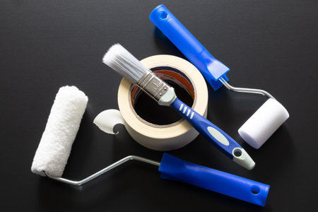 A typical painting roller isolated on black background