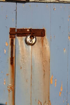 An image of an old rusty lockの写真素材