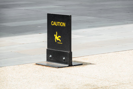 An image of a typical caution sign on the floor