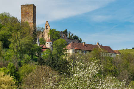 Nice small castle in Germany with blooming trees in the foregroundのeditorial素材