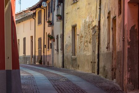 Wonderful typical Italian street in an old village - City of Barolo, Italy, Piedmontの写真素材