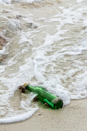 Message in the bottle on the beachの写真素材