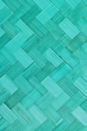 Weave bamboo texture green color use as backgroundの写真素材