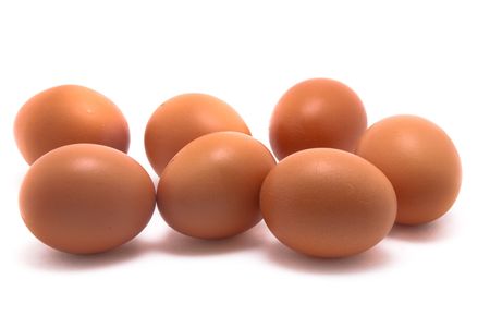 Sven eggs lying on white isolated background.の写真素材