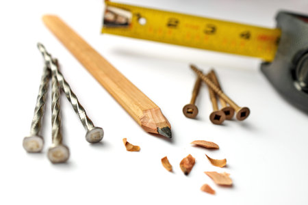 Carpenters Pencil with Sharpening Shavings, Tape Measure, Framing Nails and Deck Screws