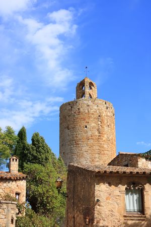 The Tower of the Hours in the medieval village of Pals (Costa Brava, Spain)の写真素材