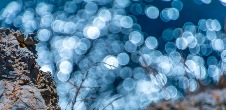 Bokeh background of sun reflections in the sea. Circlesの写真素材