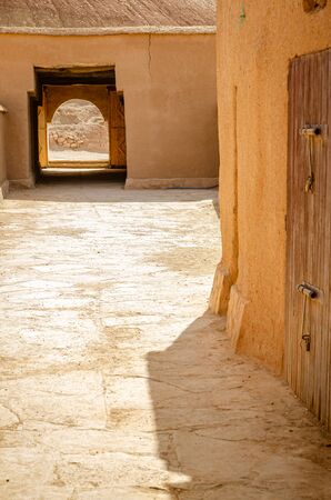 Alley with arch of the Kasbah Ait Ben Haddou in Ouarzazate, Moroccoの写真素材