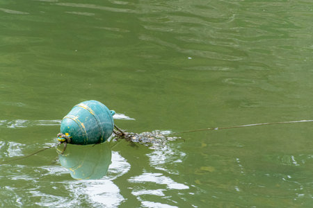 Buoy floating in the calm sea.