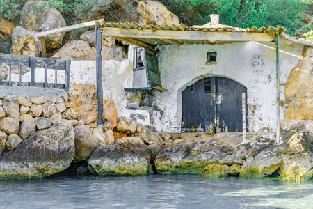 Fisherman's house in Cala Es Bot on the Island of Menorca. spainの写真素材