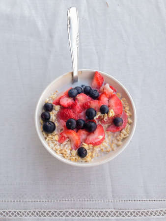 Oats and berries for breaksfast.の写真素材