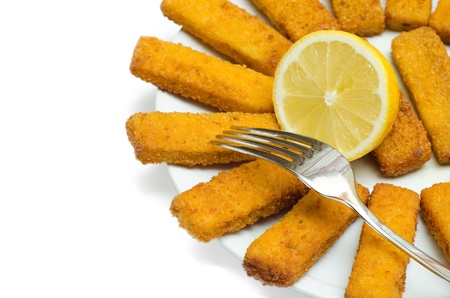 Fried and breaded cod fingersの写真素材