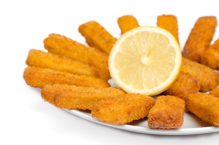 Fried and breaded cod fingersの写真素材
